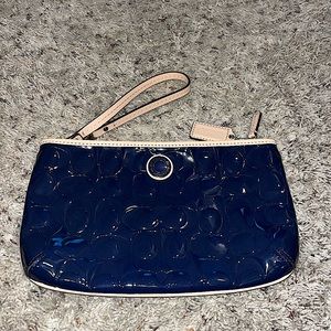 Navy blue coach wristlet never used